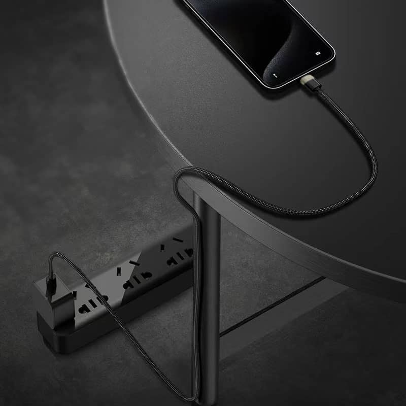 A-smartphone-being-charged-on-a-table-with-a-magnetic-charging-cable-that-neatly-wraps-around-the-table_s-leg-due-to-its-magnetic-properties-showing-the-convenience-and-organization