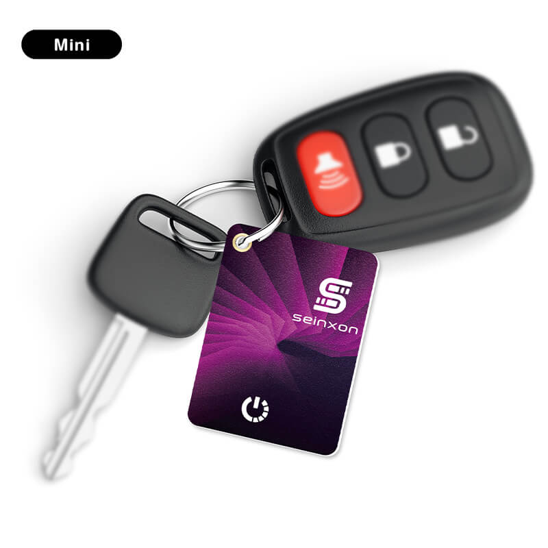 Seinxon-new-key-tracker-hangs-with-a-key-and-a-car-key