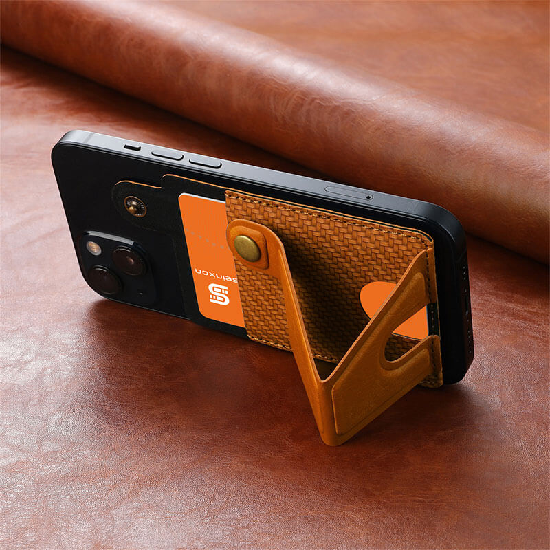 The-brown-multifunctional-card-holder-supports-the-mobile-phone-obliquely