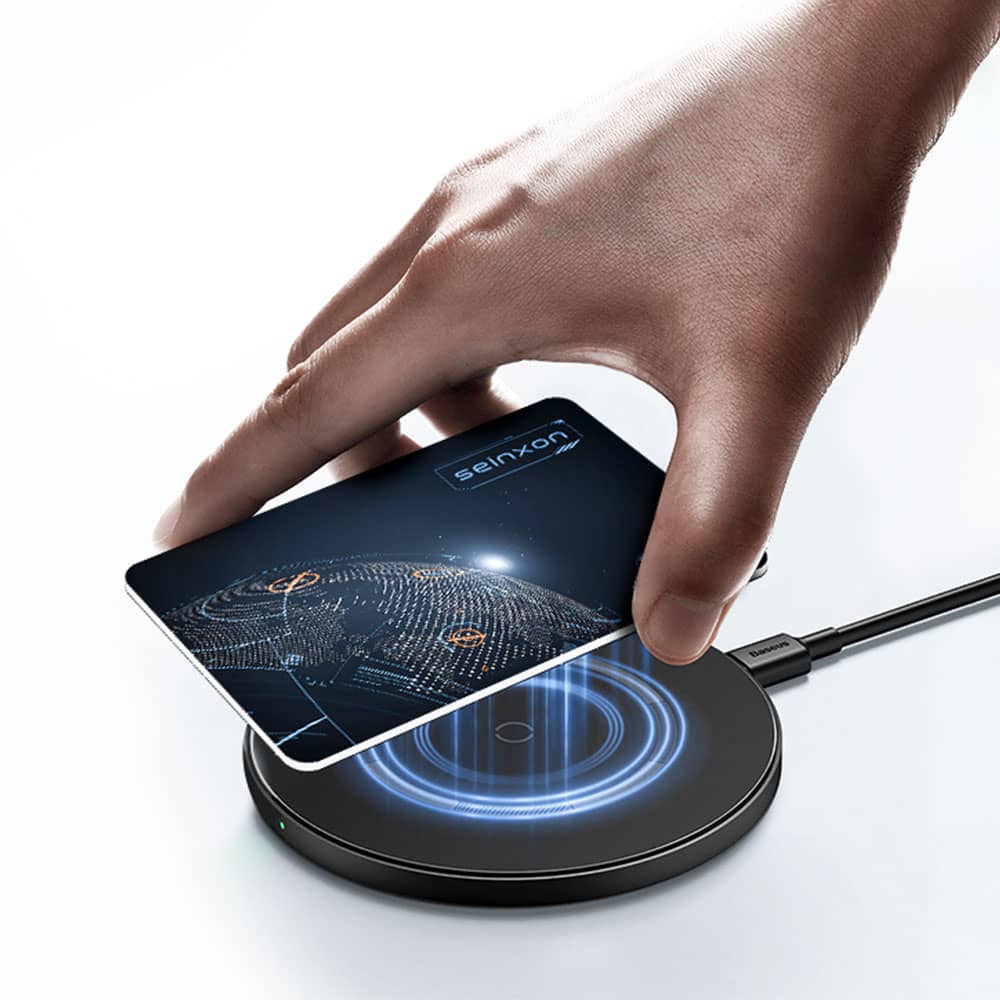 Seinxon-tracker-card-utilizing-wireless-charging-demonstrating-its-advanced-technology-integration