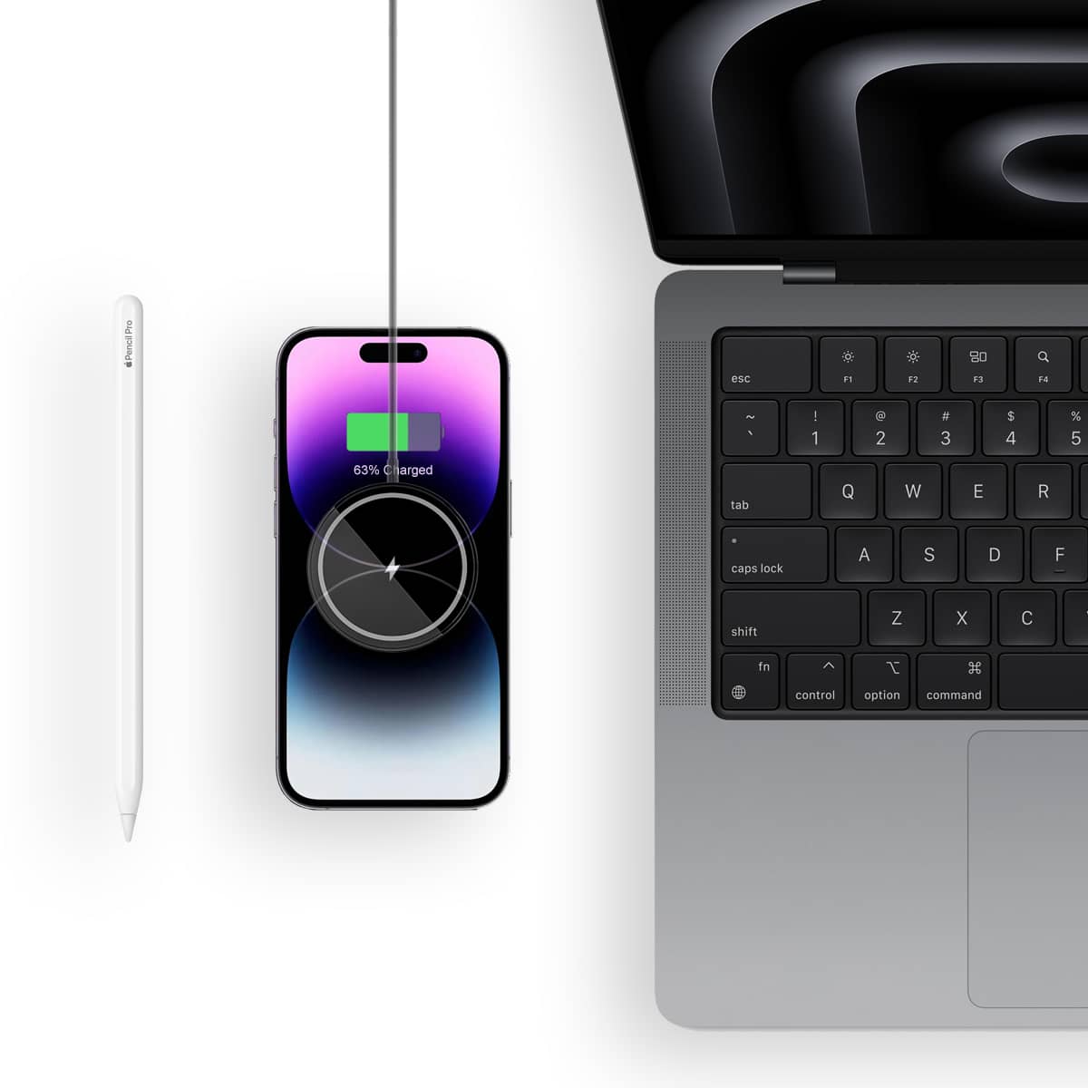 Seinxon-wireless-charger-is-charging-iPhone15-with-MacBook-and-Apple-Pencil-next-to-it