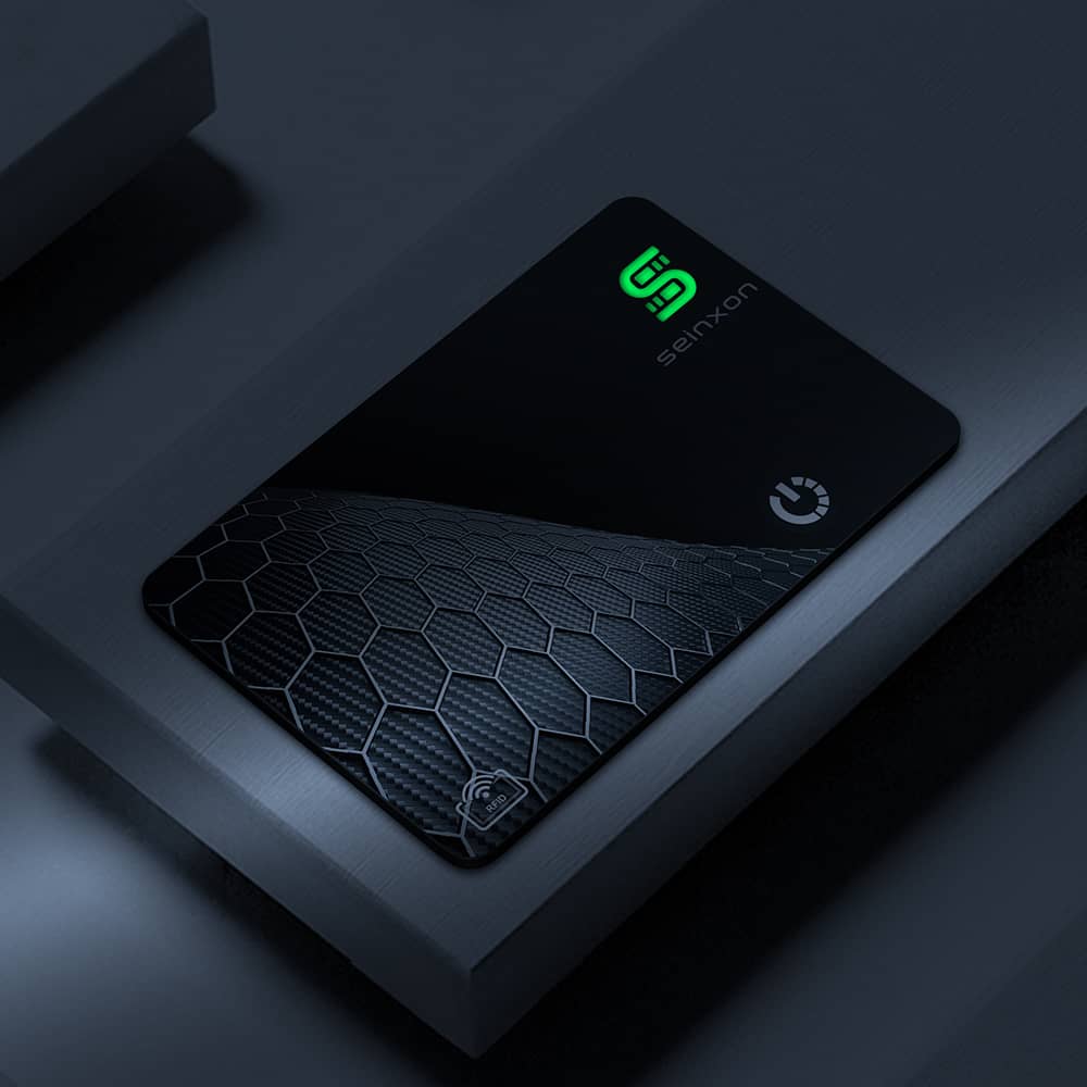 wallet-card-tracker-of-carbon-fiber-style-is-lighting-in-the-dark